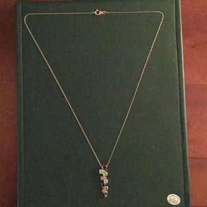 Gemstone necklace on a gold chain